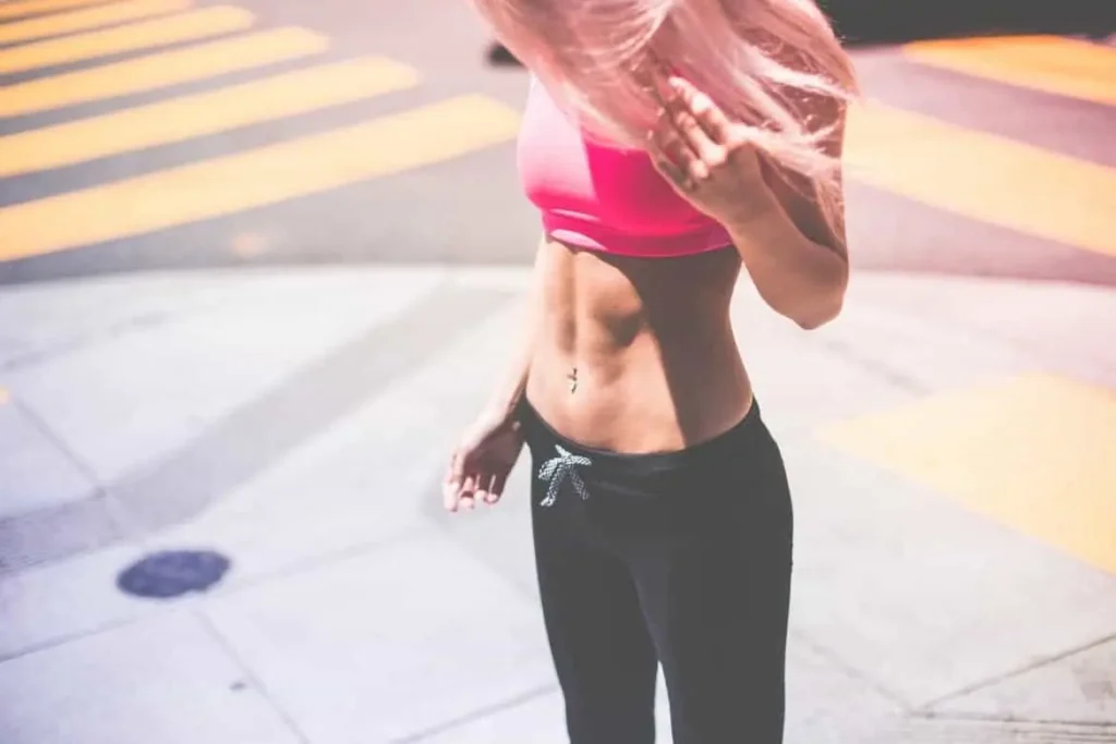 Woman with toned stomach after LA-EMS Body Sculpting Treatment Solihull Lodge